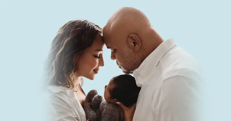 Adrienne Bailon Houghton and Israel Houghton with baby