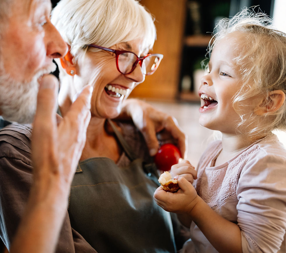 Baby touching her grandfathers face
